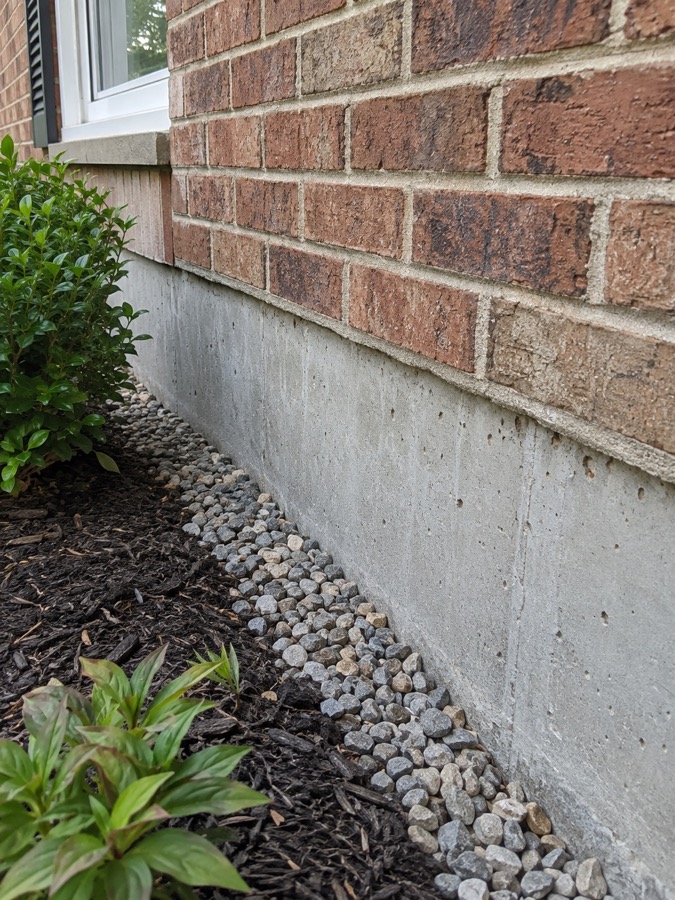 Brick exterior foundation wall of a residential home