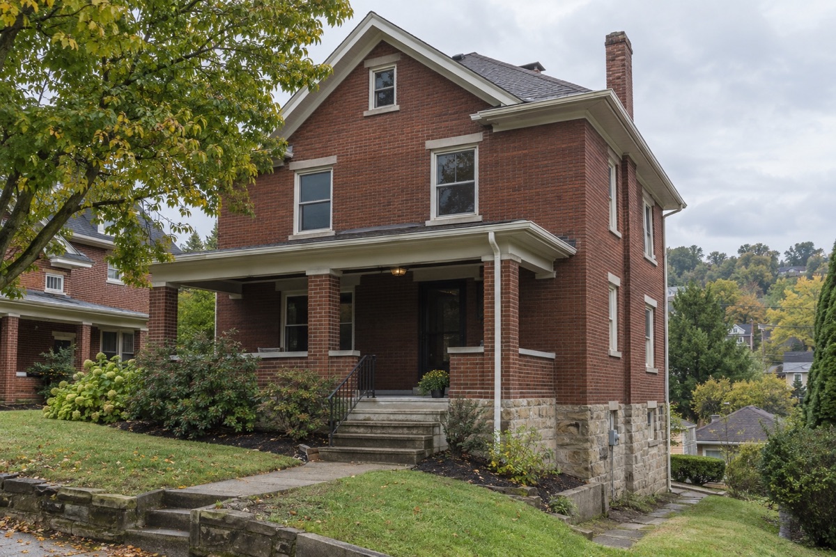 Older two-story brick home on a Pittsburgh and Southwestern PA property